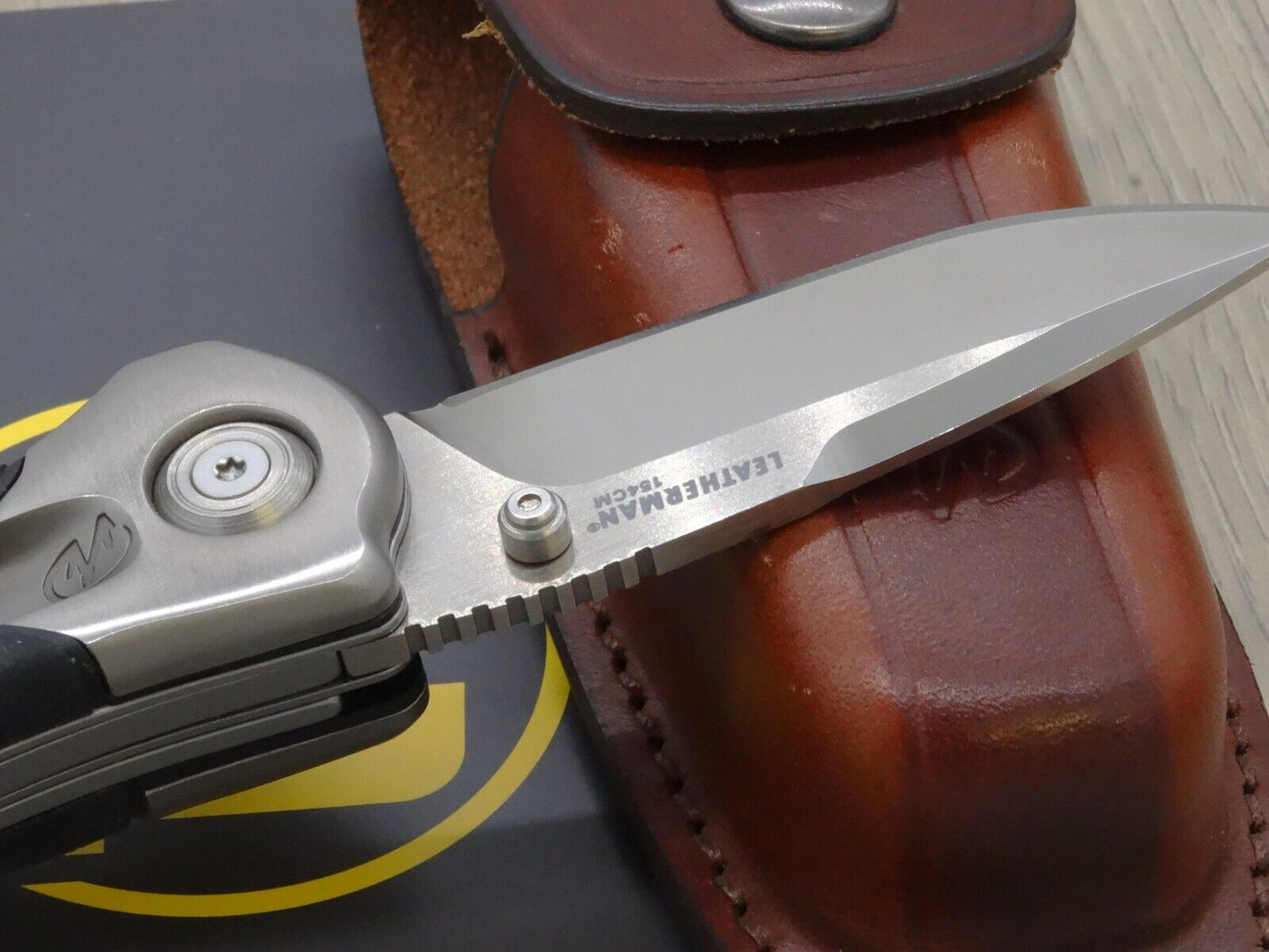 Leatherman folding knife K502X with Leather Sheath Retired Collectors Item