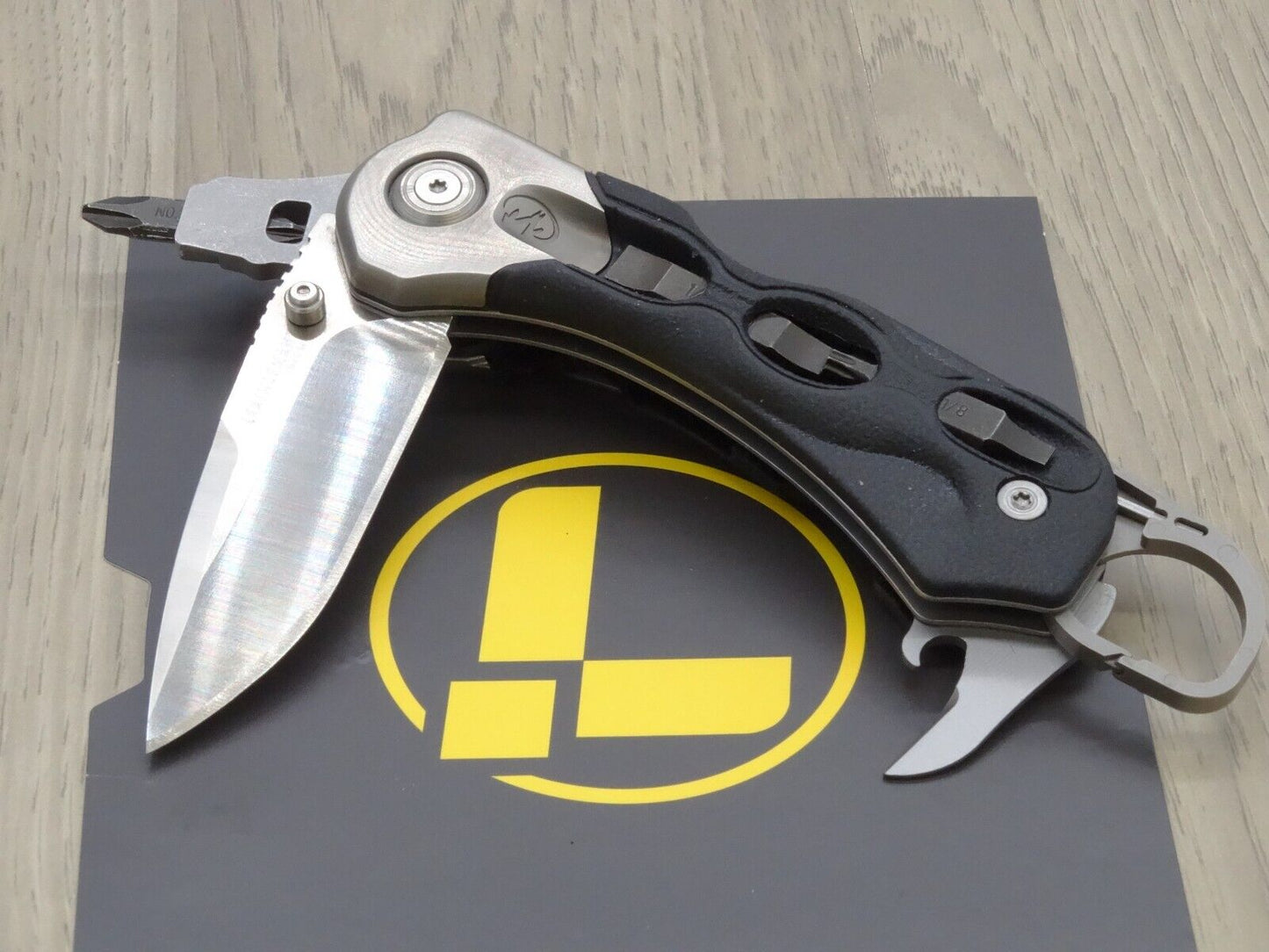 Leatherman folding knife K502X with Leather Sheath Retired Collectors Item