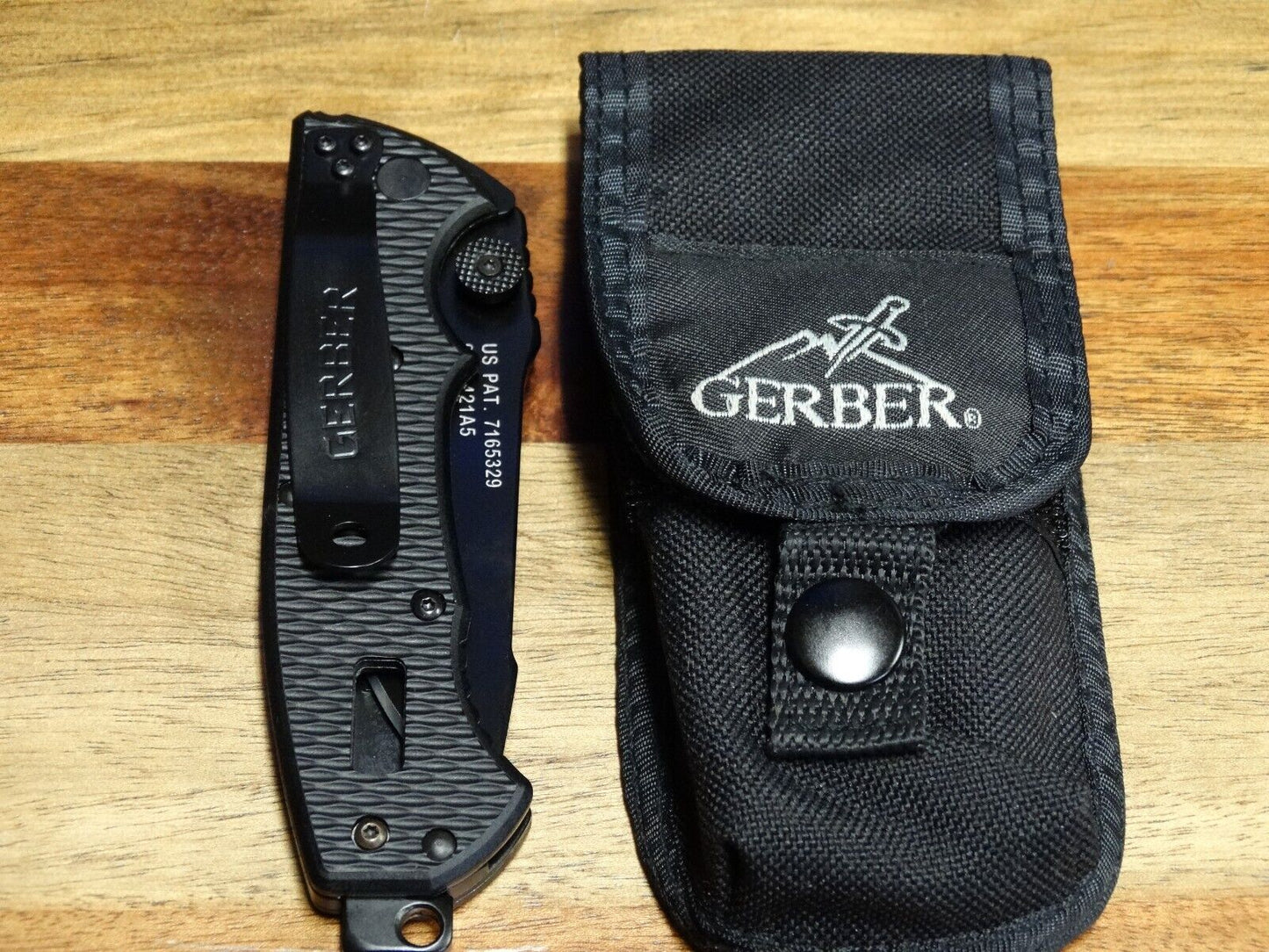 NEW Gerber Black HINDERER CLS Folding Rescue Seat Belt Cutter Oxygen Wrench