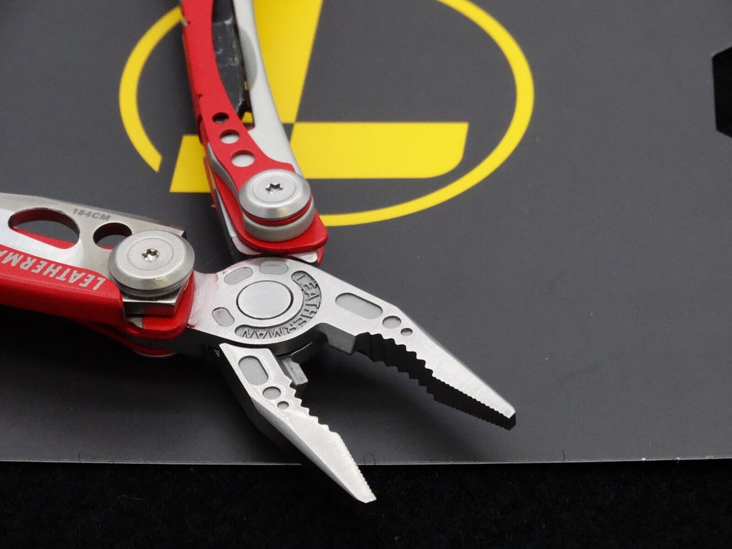 Leatherman Skeletool RX Lightweight Multitool RED W/ Leatherman Nylon Sheath