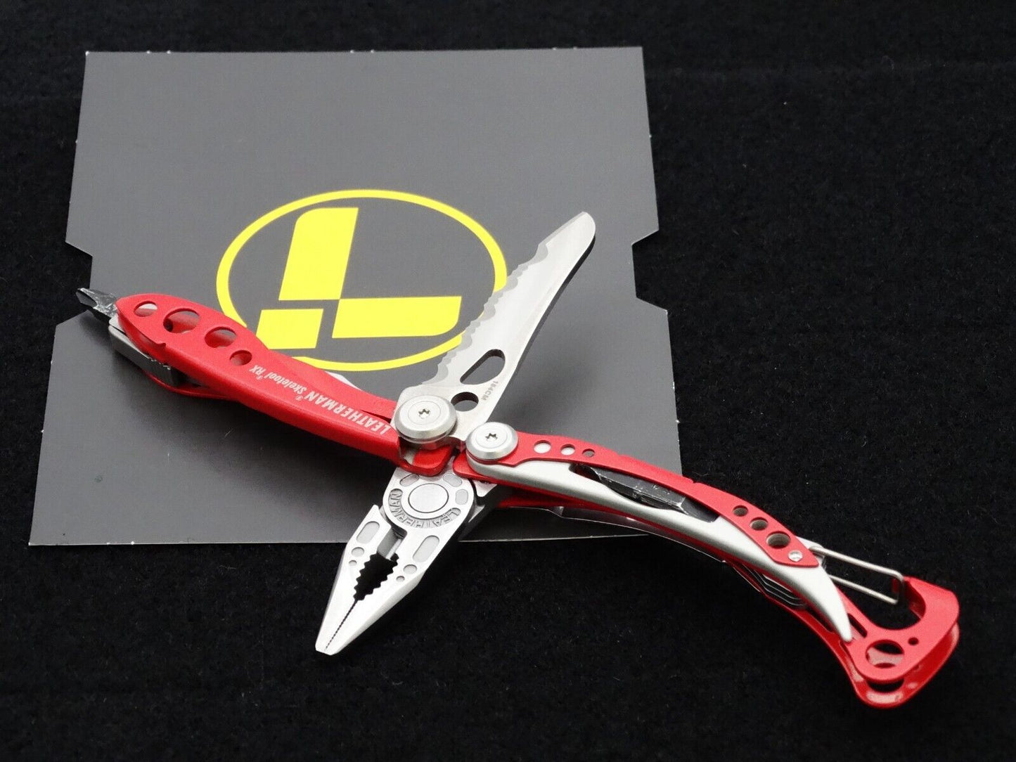 Leatherman Skeletool RX Lightweight Multitool RED W/ Leatherman Nylon Sheath